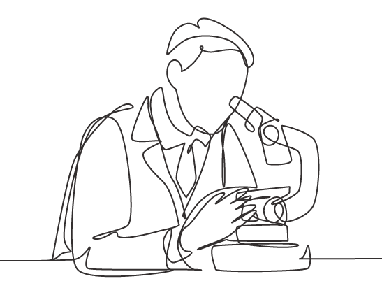 Researcher working at a microscope
